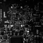 Midjourney reveals expansion to hardware amid steeper AI rivalry 2 Black and white photo of motherboard | Photo by Miguel Á. Padriñán